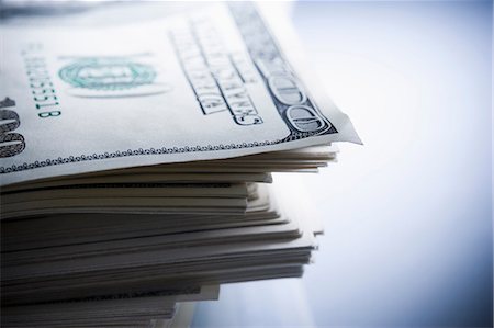 stack of money - Stack of one hundred dollar bills Stock Photo - Premium Royalty-Free, Code: 614-06442717