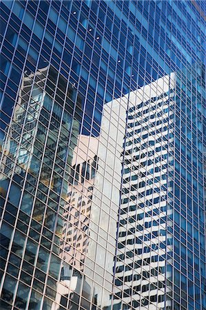 Other buildings reflected in skyscraper Stock Photo - Premium Royalty-Free, Code: 614-06442807