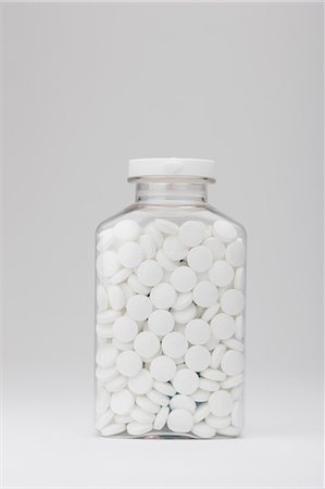 Pills in bottle Foto de stock - Sin royalties Premium, Código: 614-06443112