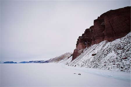 sleigh in the winter - Red cliffs in snowy landscape Stock Photo - Premium Royalty-Free, Code: 614-06537459