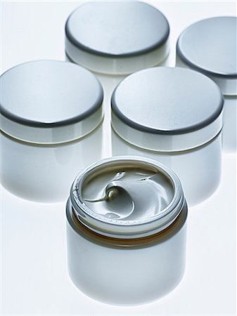 Close up of white jar of lotion Stock Photo - Premium Royalty-Free, Code: 614-06624491