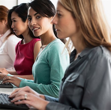 simsearch:614-06043814,k - Businesswomen working at computers Stock Photo - Premium Royalty-Free, Code: 614-06624656