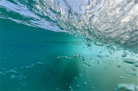 Crashing wave viewed underwater Stock Photo - Premium Royalty-Free, Code: 614-06624671