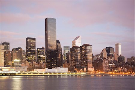 New York City skyline lit up at dusk Stock Photo - Premium Royalty-Free, Code: 614-06624749