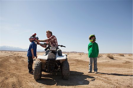 simsearch:614-06623416,k - Father and sons on four-wheeler Stock Photo - Premium Royalty-Free, Code: 614-06625241