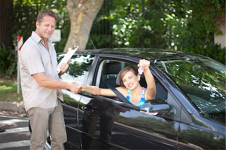 simsearch:614-06623416,k - Driving instructor congratulating student Stock Photo - Premium Royalty-Free, Code: 614-06623429