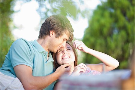 simsearch:614-06896801,k - Smiling couple relaxing in park Stock Photo - Premium Royalty-Free, Code: 614-06623546