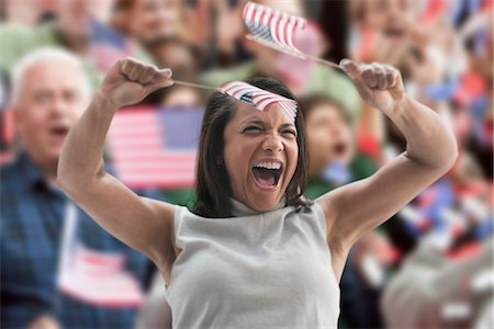 simsearch:614-06718194,k - Excited woman waving american flags at rally Stock Photo - Premium Royalty-Free, Code: 614-06718209