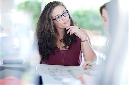 Businesswomen talking in meeting Stock Photo - Premium Royalty-Free, Code: 614-06718294