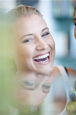 simsearch:649-07063808,k - Close up of woman's smiling face Stock Photo - Premium Royalty-Free, Code: 614-06718380