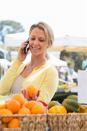 shopping phone - Woman shopping at farmer's market Stock Photo - Premium Royalty-Free, Code: 614-06719293
