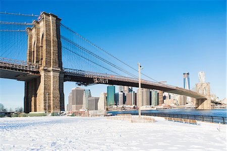 river bridge in america - Brooklyn Bridge and snowy park Stock Photo - Premium Royalty-Free, Code: 614-06719510