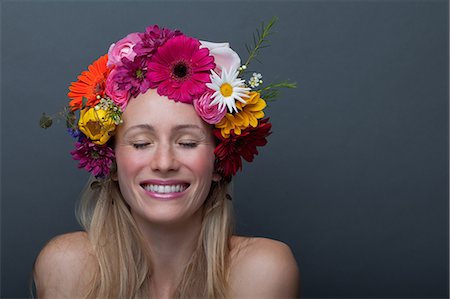 simsearch:614-06814236,k - Young woman wearing garland of flowers on head Stock Photo - Premium Royalty-Free, Code: 614-06814186