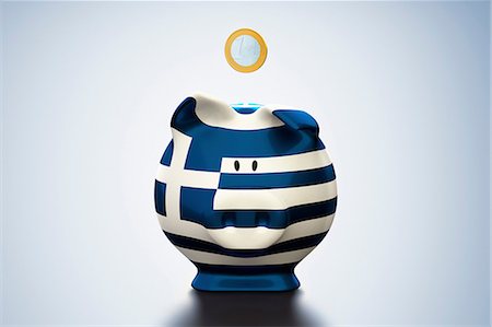 Euro coin above Greek flag piggy bank Stockbilder - Premium RF Lizenzfrei, Bildnummer: 614-06813419