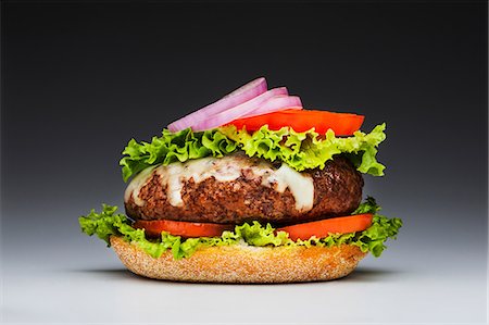 Burger with top missing Photographie de stock - Premium Libres de Droits, Code: 614-06813731