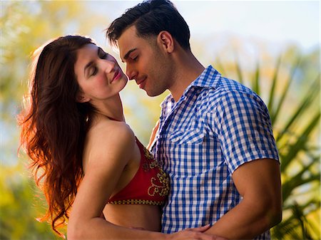 Passionate young couple embracing Stock Photo - Premium Royalty-Free, Code: 614-06895991