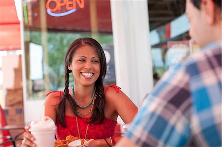 diner - Young woman in diner, smiling Stock Photo - Premium Royalty-Free, Code: 614-06896113