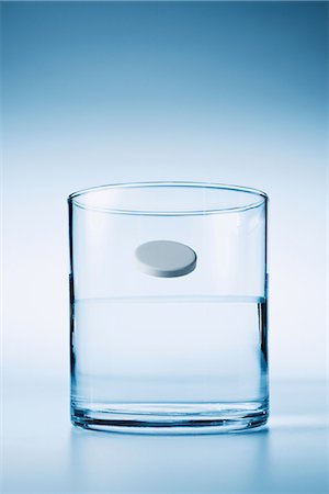 simsearch:614-06813723,k - Tablet about to drop into glass of water Stock Photo - Premium Royalty-Free, Code: 614-06896420