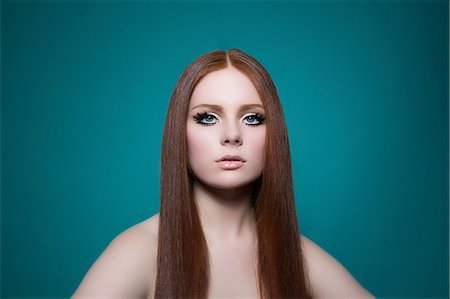 false eyelashes - Portrait of woman with long red hair Stock Photo - Premium Royalty-Free, Code: 614-06896622