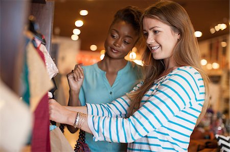 second hand - Two young women in vintage shop Stock Photo - Premium Royalty-Free, Code: 614-06896759