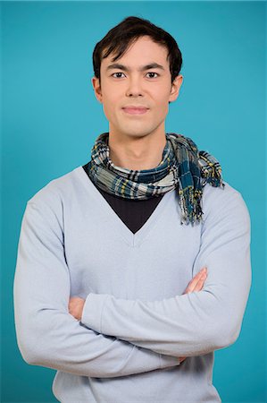 simsearch:614-06896861,k - Portrait of young man wearing blue jumper and scarf Stock Photo - Premium Royalty-Free, Code: 614-06896855