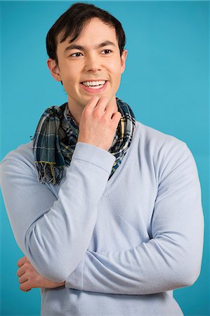 simsearch:614-06896861,k - Portrait of young man wearing blue jumper and scarf Stock Photo - Premium Royalty-Free, Code: 614-06896857