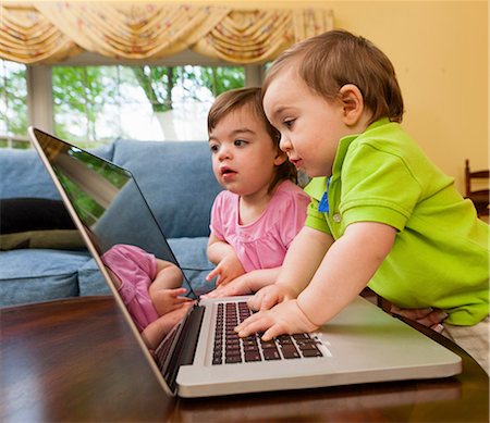 simsearch:614-06897440,k - Two young toddlers playing with laptop Stock Photo - Premium Royalty-Free, Code: 614-06897444