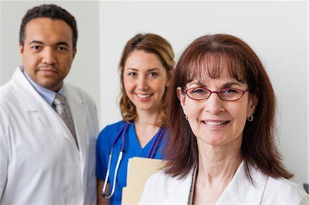 Medical professionals together in hospital, portrait Stock Photo - Premium Royalty-Free, Code: 614-06897470