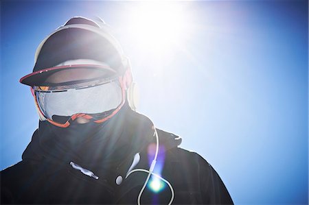 snowboarder (male) - Man wearing ski mask and jacket Stock Photo - Premium Royalty-Free, Code: 614-06897497