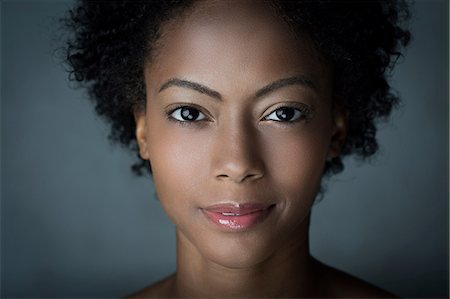 fashion model (female) - Portrait of woman with afro hair Stock Photo - Premium Royalty-Free, Code: 614-06898149