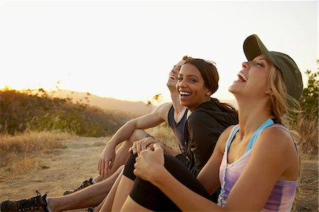 photos of blonde woman with black man - Friends enjoying hillside Stock Photo - Premium Royalty-Free, Code: 614-06898370