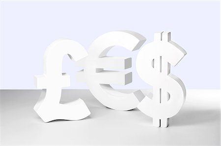 Dollar, Euro and Pound signs on white background Foto de stock - Sin royalties Premium, Código: 614-06974064