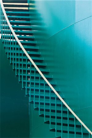 shipping containers for rail - Green staircase on storage tank Stock Photo - Premium Royalty-Free, Code: 614-06974086