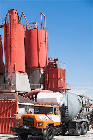 Truck parked by cement factory Stock Photo - Premium Royalty-Free, Code: 614-06974126