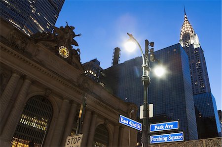 symbols of road signs - Grand Central Station and Chrysler Building at dusk, New York City, USA Stock Photo - Premium Royalty-Free, Code: 614-06974181