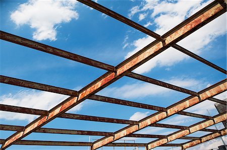 deteriorating building - Open rusting roof framework Stock Photo - Premium Royalty-Free, Code: 614-06974221