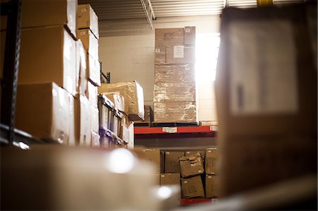 storage (industrial and commercial) - Cardboard boxes stored in warehouse Stock Photo - Premium Royalty-Free, Code: 614-07031310