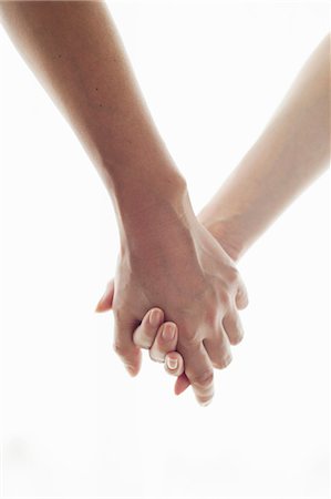 dependence - Man and woman holding hands, portrait Stock Photo - Premium Royalty-Free, Code: 614-07031594