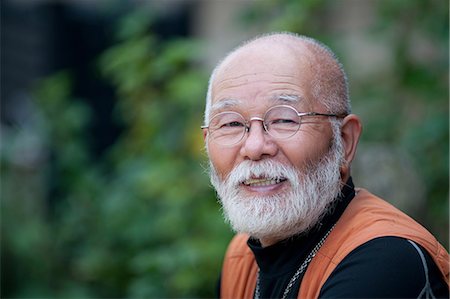 Close up of senior man smiling, portrait Stock Photo - Premium Royalty-Free, Code: 614-07032230