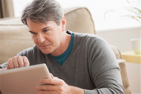 people home office not shopping - Mature man using digital tablet Stock Photo - Premium Royalty-Free, Code: 614-07146191