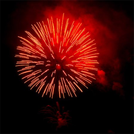 fireworks colored picture - Fireworks exploding in night sky Stock Photo - Premium Royalty-Free, Code: 614-07146685