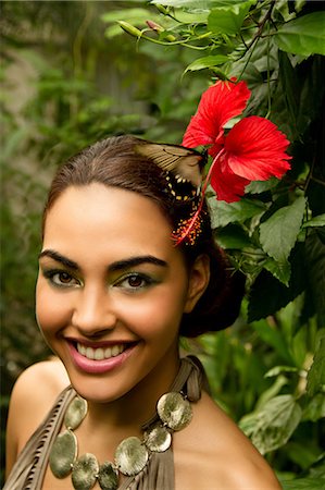 simsearch:614-07194271,k - Portrait of young woman with red orchid and foliage Foto de stock - Sin royalties Premium, Código: 614-07194289