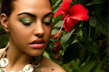 simsearch:614-07194271,k - Portrait of young woman with red orchid and foliage Foto de stock - Sin royalties Premium, Código: 614-07194290