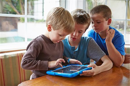 simsearch:614-08270379,k - Three boys playing with digital tablet Stock Photo - Premium Royalty-Free, Code: 614-07652240