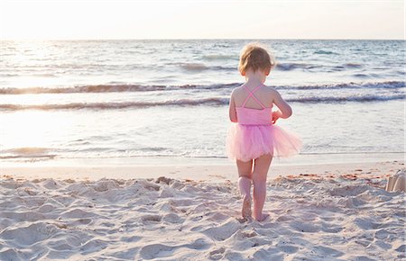 Girl wearing tutu on beach in Tulum, Mexico Stock Photo - Premium Royalty-Free, Code: 614-07652453