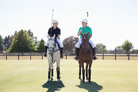 pictures of men riding horses - Two adult men playing polo Stock Photo - Premium Royalty-Free, Code: 614-07708244