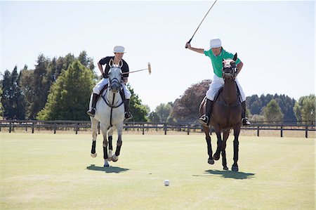 Two adult men playing polo Stock Photo - Premium Royalty-Free, Code: 614-07708242