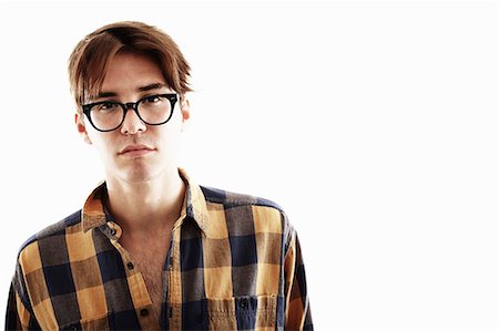 simsearch:649-07560393,k - Studio portrait of young man in eyeglasses Photographie de stock - Premium Libres de Droits, Code: 614-07735533