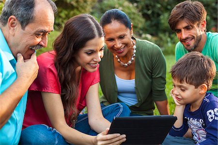 simsearch:614-07735242,k - Three generation family using digital tablet in garden Stock Photo - Premium Royalty-Free, Code: 614-08000173