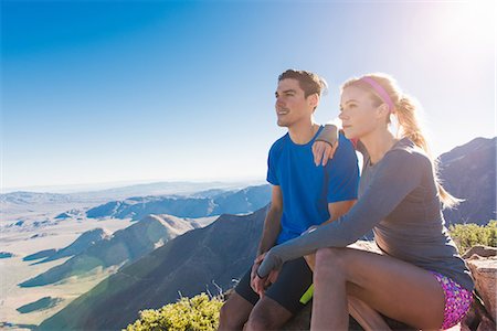 Trail running couple looking out at landscape on Pacific Crest Trail, Pine Valley, California, USA Stock Photo - Premium Royalty-Free, Code: 614-08065993